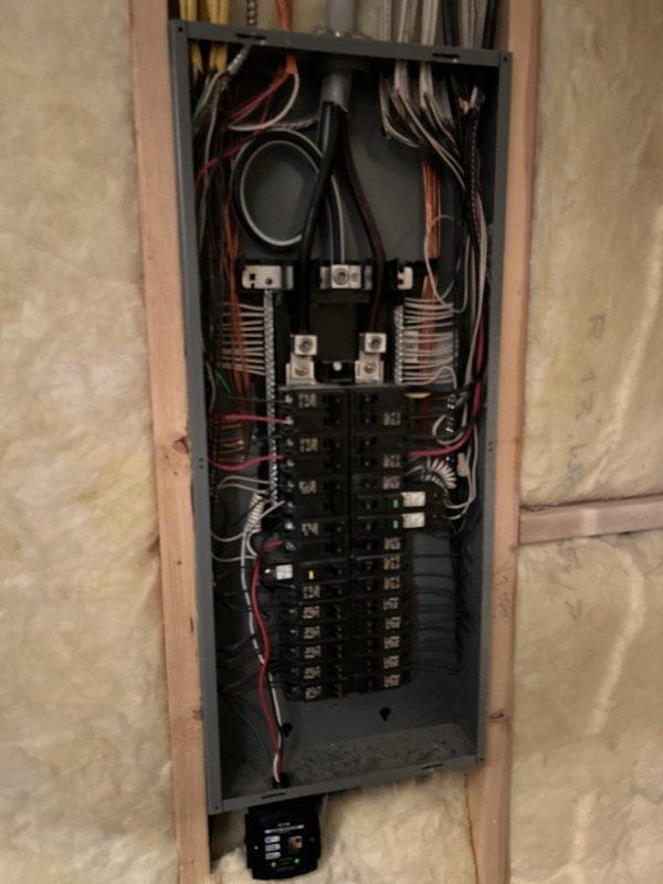 Completed routine electrical maintenance inspection for residential property as part of membership plan. Inspected and tested GFCI outlet, verified proper operation with green indicator light illuminated and TEST/RESET functionality working correctly. Performed comprehensive electrical panel inspection, checking all circuit breakers, bus bar connections, and service entrance conductors for proper operation and safety compliance. All electrical components found to be functioning within normal parameters with no issues identified.