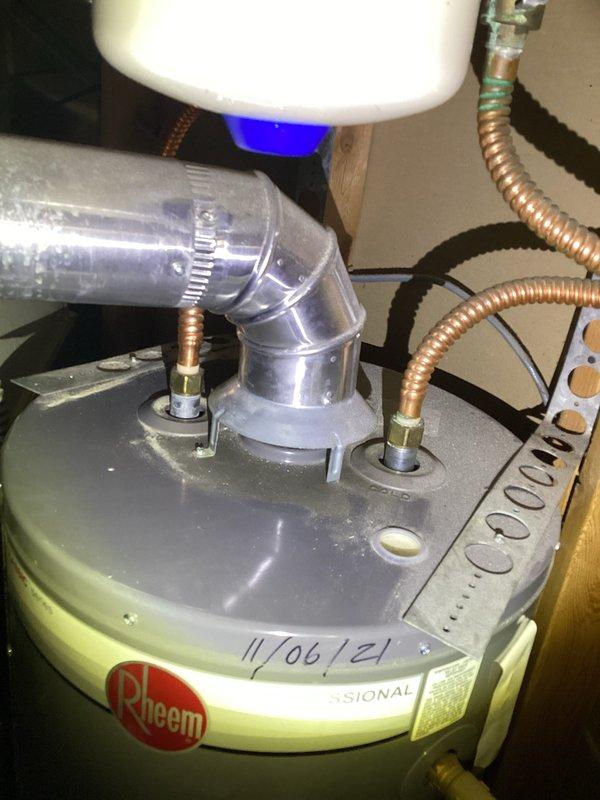 Completed comprehensive plumbing membership inspection at residential property. Inspected and tested bathroom widespread faucet fixture for proper operation and flow, confirming functionality of hot and cold water controls. Performed thorough inspection of 1-2 year old Rheem tanked water heater located in basement, examining flexible copper connectors, brass fittings, inlet/outlet connections, and overall unit condition with no issues identified.