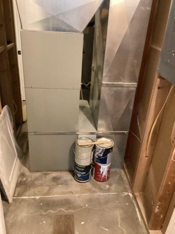Responded to callback for recurring cooling issue on 8-9 year old system with frozen evaporator coil. Previous visit identified restriction in refrigerant system causing inadequate cooling performance. Inspected outdoor condenser unit located in side yard and indoor air handler with ductwork in basement. Confirmed system restriction remains unresolved, requiring either extensive refrigerant system repairs or full system replacement. Provided customer with repair options ranging from component-level fixes to complete equipment upgrade, awaiting decision on how to proceed with resolution.