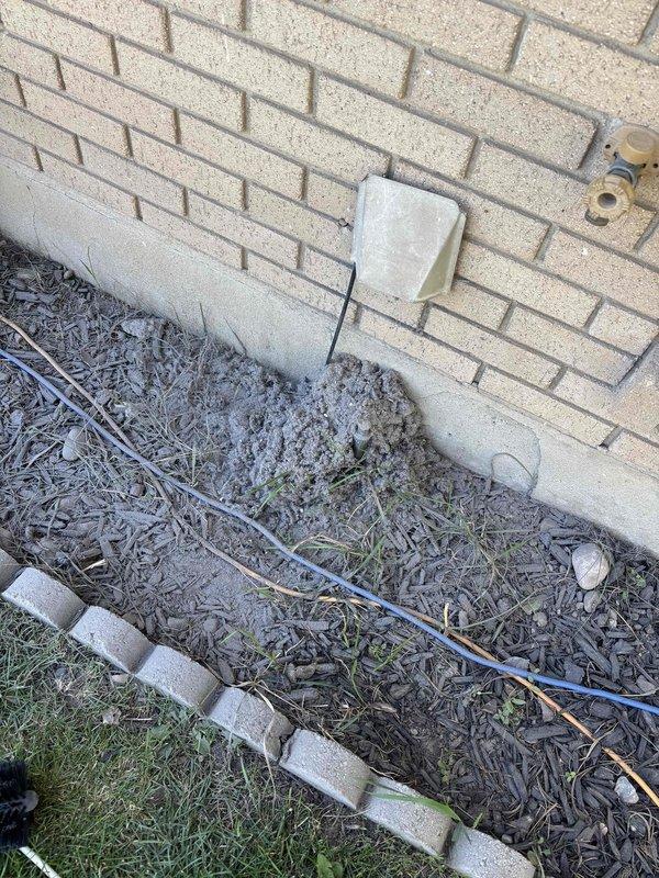 Performed comprehensive dryer vent cleaning service for residential basement installation. Accessed and cleaned the complete dryer venting system from interior basement connection point through exterior termination, which was confirmed to be less than 25 feet above ground level. Removed accumulated lint, debris, and fiber buildup from ductwork to restore proper airflow and reduce fire hazard risk. Verified exterior vent cover was clear of obstructions and functioning properly upon completion.