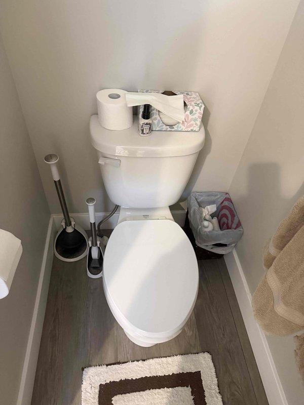 Completed annual membership plumbing inspection at ADU property. Performed comprehensive evaluation of 5-year-old tanked water heater located in utility closet, inspecting for proper operation, signs of corrosion, and potential maintenance needs. Inspected kitchen plumbing fixtures including double-basin stainless steel sink with pull-down spray faucet, checking for leaks, proper water flow, and drainage function. Examined bathroom plumbing system including toilet operation, water supply connections, and shut-off valves. All fixtures photographed and documented as part of preventative maintenance inspection protocol.