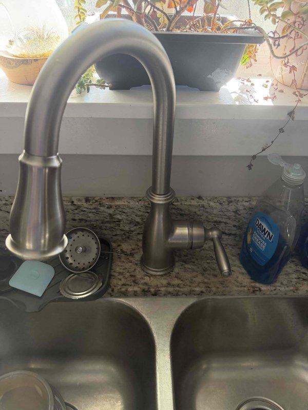 Completed annual membership plumbing inspection at ADU property. Performed comprehensive evaluation of 5-year-old tanked water heater located in utility closet, inspecting for proper operation, signs of corrosion, and potential maintenance needs. Inspected kitchen plumbing fixtures including double-basin stainless steel sink with pull-down spray faucet, checking for leaks, proper water flow, and drainage function. Examined bathroom plumbing system including toilet operation, water supply connections, and shut-off valves. All fixtures photographed and documented as part of preventative maintenance inspection protocol.