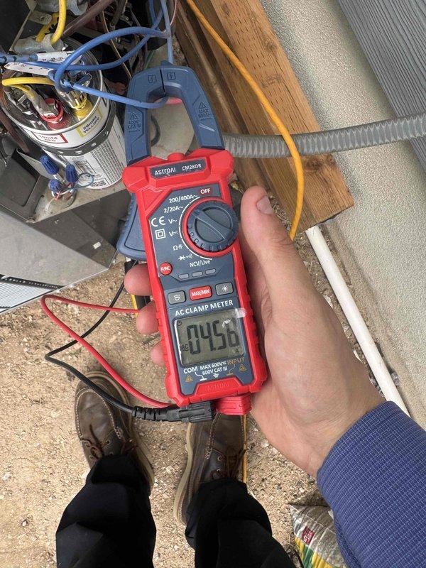 Completed comprehensive cooling maintenance on a 10-year-old single HVAC system as part of recurring membership service. Performed electrical diagnostics using clamp meter to verify amperage draw and system performance, inspected dual-run capacitor with 20mfd and 50mfd ratings confirming proper operation, and examined all electrical connections including contactor, relay, and associated wiring. System operating within normal parameters with no issues identified during inspection.