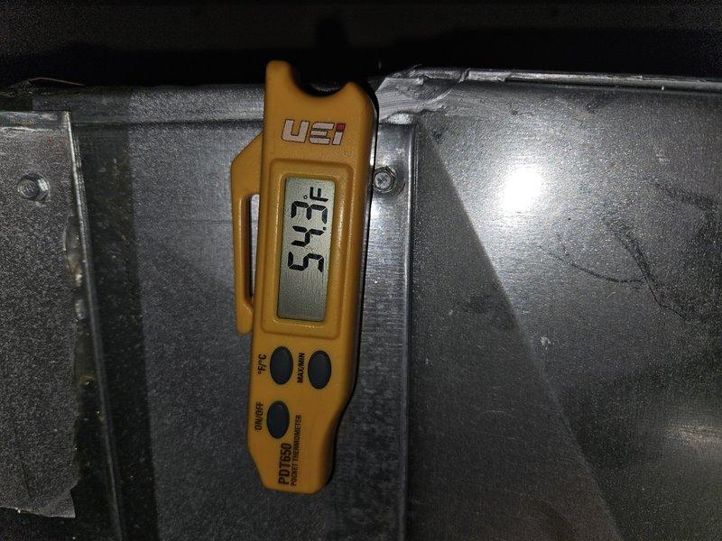 Responded to no cooling complaint on residential air conditioning system. Performed diagnostic evaluation and temperature measurements at supply and return registers. Found system operating with low refrigeant charge and deficient capacitor affecting compressor performance. Contrary to previous diagnosis, confirmed compressor was still functional but system cooling capacity was significantly compromised. Identified probable refrigerant leak requiring location and repair. Presented customer with repair options including comprehensive leak search and repair, capacitor replacement, and refrigerant recharge. Documented temperature differential readings and system operating conditions with diagnostic equipment.