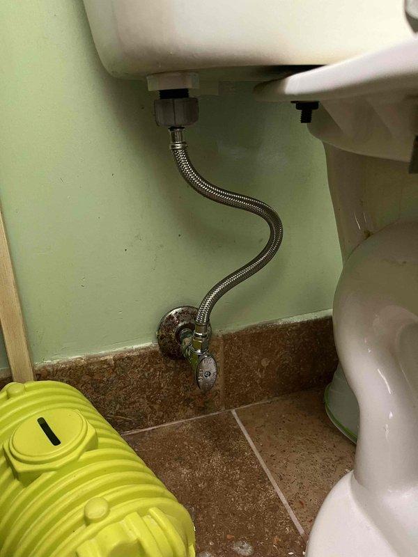 Installed a 40-gallon natural draft Rheem water heater and brought all connections up to current code requirements. Replaced an existing toilet with a round American Standard Cadet model, including new wax ring seal and braided stainless steel supply line while reinstalling the existing slow-close wooden seat. Installed a Moen Brecklyn kitchen faucet in brushed nickel finish with new supply connections.