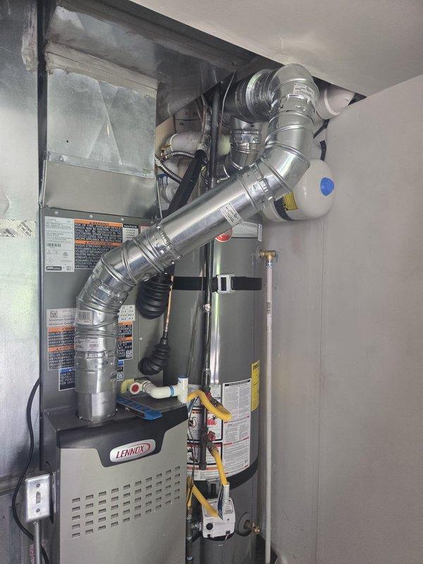 Completed callback to address venting issues following full system installation. The furnace and water heater venting required proper reconfiguration and code-compliant installation, as the unit had been temporarily disconnected with gas shut off pending receipt of necessary venting materials. Successfully installed and properly vented both the Lennox SL280UH070V36AK furnace and water heater to manufacturer specifications and local code requirements. Restored gas service to furnace and verified safe operation of all equipment.