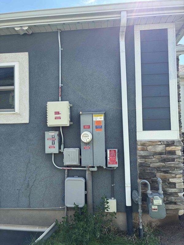 Completed comprehensive Green Shield electrical maintenance inspection and safety evaluation of residential electrical system. Performed thorough examination of main service panel, verifying proper operation of all six circuit breakers, inspecting bus bar connections, and confirming secure wire terminations for all branch circuits and grounding conductors. Inspected exterior electrical service equipment including meter base, disconnect panel, and associated conduit connections to ensure compliance with safety standards and proper system functionality.