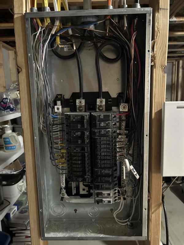 Completed comprehensive electrical maintenance inspection as part of recurring membership service. Performed thorough evaluation of main electrical service panel, verifying proper circuit breaker operation, checking all wire connections and terminations at bus bars, and inspecting overall panel integrity and wire management. Evaluated residential outlet conditions throughout accessible areas, noting use of multi-outlet adapters and verifying proper grounding and functionality. All electrical components inspected were found to be operating within normal parameters with no immediate safety concerns identified.