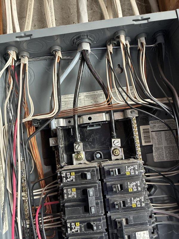 Completed Green Shield Electrical Inspection as part of recurring maintenance service. Performed comprehensive evaluation of electrical panel, verifying all circuit breakers, bus bar connections, and interior wiring for proper operation and code compliance. Inspected outlet receptacles throughout property, identifying damaged cover plate requiring attention, and conducted voltage measurements to confirm proper electrical function at all accessible points.