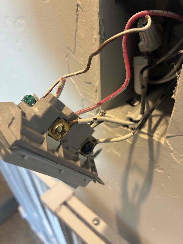 Responded to a partial power outage affecting a single room. Diagnosed and repaired faulty electrical outlet with compromised wiring connections, reconnected and secured all conductors to proper terminals with appropriate grounding. Replaced defective double rocker switch assembly in affected circuit, installed new device in existing electrical box, and restored full power to the room.