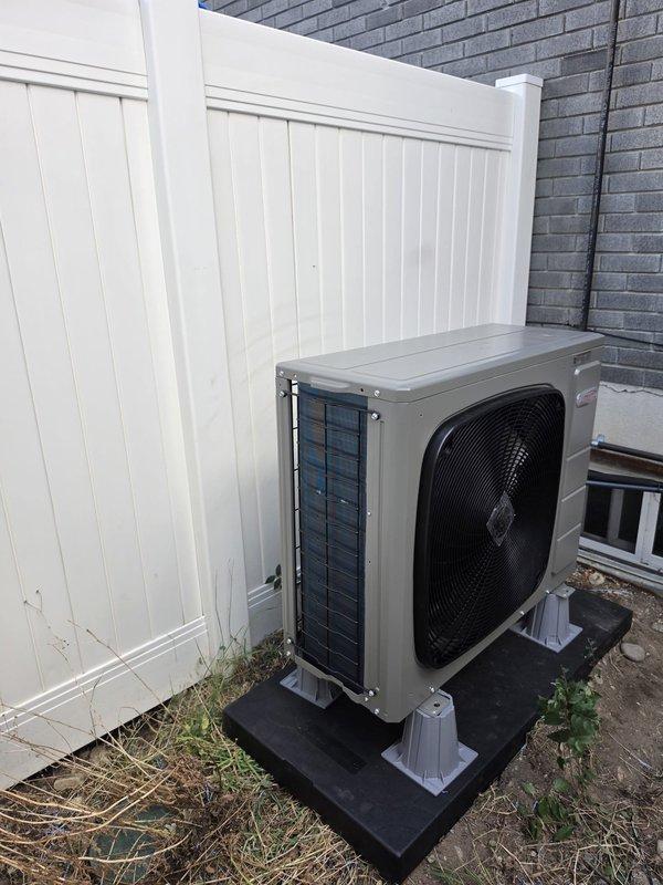 Completed full HVAC system replacement in basement, installing Lennox ML15KSPV-030-230 outdoor condensing unit and CK40CT-30/36A-71 air handler. Reused existing lineset after performing thorough flush to ensure system cleanliness and proper refrigerant flow. Retained existing thermostat per customer request. Mounted outdoor unit on composite pad in side yard area against building exterior with proper clearances from fencing and foundation. Connected refrigerant lines and electrical service, tested system operation, and verified proper airflow and temperature differential. System commissioned successfully and left in full operational status.