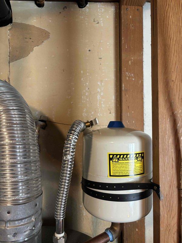 Installed a new 50-gallon gas water heater with complete code-compliant upgrades. Installation included new water and gas connections with dedicated shut-off valves and flexible supply lines. Unit was placed in a drain pan with piping routed to floor drain for leak containment. Installed seismic safety straps to secure unit per local requirements. Mounted new thermal expansion tank and pressurized to match existing house water pressure. All gas connections were tested for leaks and verified safe. Water supply lines and connections were pressure tested and confirmed operational.

Additionally performed plumbing repairs in bathroom areas. Used hand auger to clear obstruction in bathroom drain line, restoring proper drainage. Replaced worn flapper valve in master bathroom toilet with American Standard traditional-style flapper, resolving running water issue and restoring proper flush function.

All work was performed in accordance with local plumbing codes. Required permits were obtained 