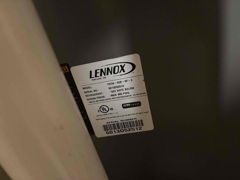 Completed comprehensive furnace maintenance on 12-year-old Lennox CB29-42B-0F-2 unit located in basement. Performed full system inspection including heat exchanger examination, burner assembly cleaning, and flame sensor maintenance. Verified proper gas pressure and combustion efficiency. Inspected and tested all safety controls including limit switches and rollout sensors. Checked blower motor operation and lubricated as needed. Replaced air filter and cleaned blower compartment. Tested thermostat operation and verified proper system cycling. Inspected condensate drain system and PVC venting for proper operation and secure connections. Confirmed R-410A refrigerant specifications on unit nameplate. All components operating within manufacturer specifications. System ready for heating season.