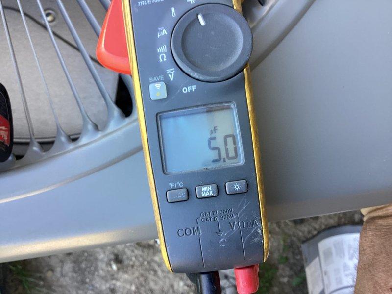 Completed comprehensive air conditioning maintenance tune-up as part of membership plan. Performed full system inspection including visual examination of outdoor condensing unit and electrical components. Tested capacitor using clamp meter, measuring 5.0 microfarads to verify proper operation. Inspected electrical panel, meter base, disconnect box, and associated conduit for proper connections and safety compliance. Evaluated ductwork and verified system airflow. All components found operating within normal parameters with no deficiencies noted. System is functioning properly and ready for continued operation.