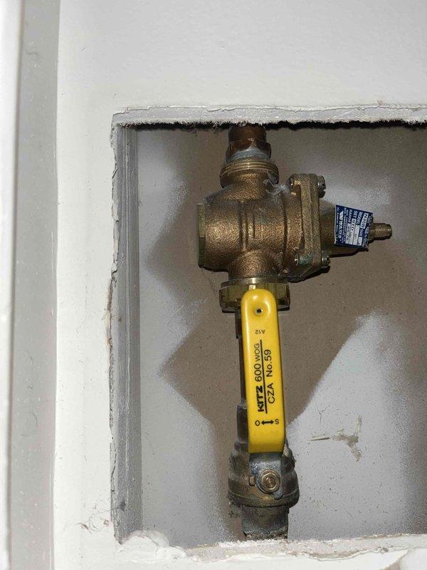 Responded to a water pressure concern at the residence. Inspected the main gas shut-off valve serving the standard water heater and verified proper operation of the quarter-turn ball valve. Installed a new pressure gauge on the exterior water supply line to monitor incoming water pressure, securing the gauge with appropriate fittings and clamps to provide the homeowner with accurate pressure readings for ongoing system monitoring.