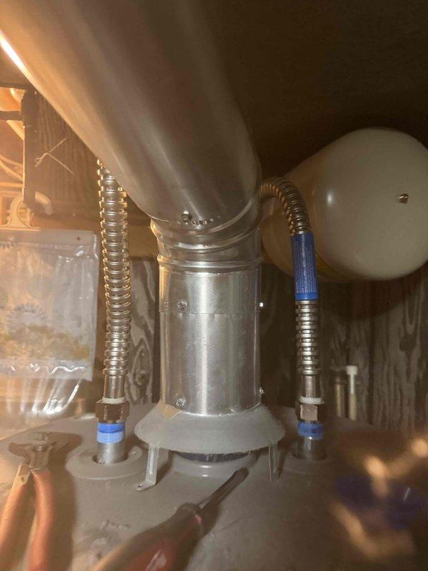 Responded to no hot water condition affecting entire home. Inspected 5-year-old tanked water heater located in basement. Diagnosed failed heating element preventing unit from producing hot water. Replaced defective heating element, tested system operation, and restored full hot water service to residence.