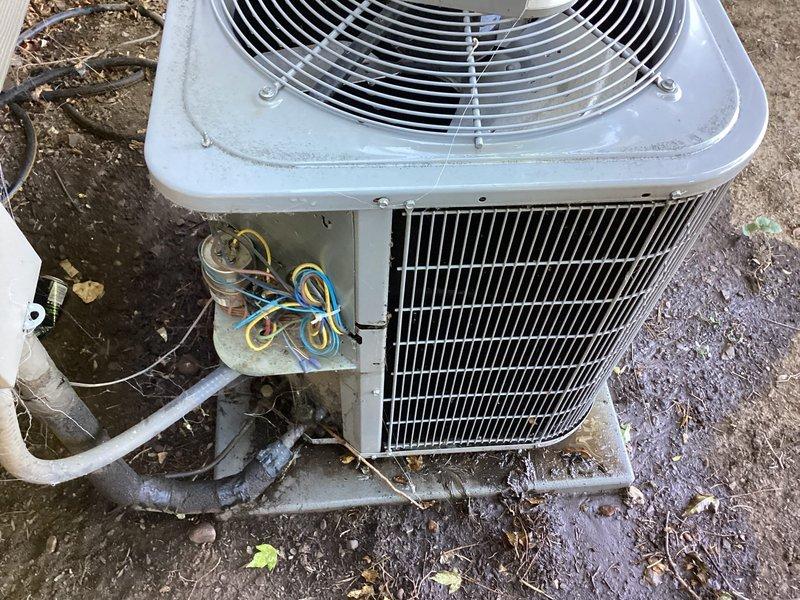 Completed annual cooling maintenance on 12-year-old single-zone system with outdoor condenser unit and furnace located in crawlspace accessible through closet. Performed comprehensive tune-up inspection of ground-mounted condensing unit, including electrical diagnostics using clamp meter to verify amperage draws and component operation. Inspected heat exchanger coils, fan assembly, refrigerant lines, and electrical connections. Replaced air filter as part of routine maintenance protocol. No issues reported by customer prior to visit; system found operating within normal parameters upon completion of preventative maintenance service.