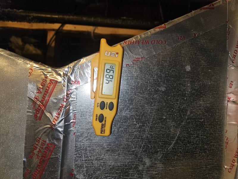 Responded to callback for AC system that stopped working shortly after thermostat replacement. Upon arrival, performed diagnostic temperature readings on supply ductwork, measuring 93.7°F and 37.3°F at different points in the system to assess airflow and cooling performance. Investigated underlying cause of system failure beyond the previously replaced thermostat to determine why unit ceased operation after initial repair.