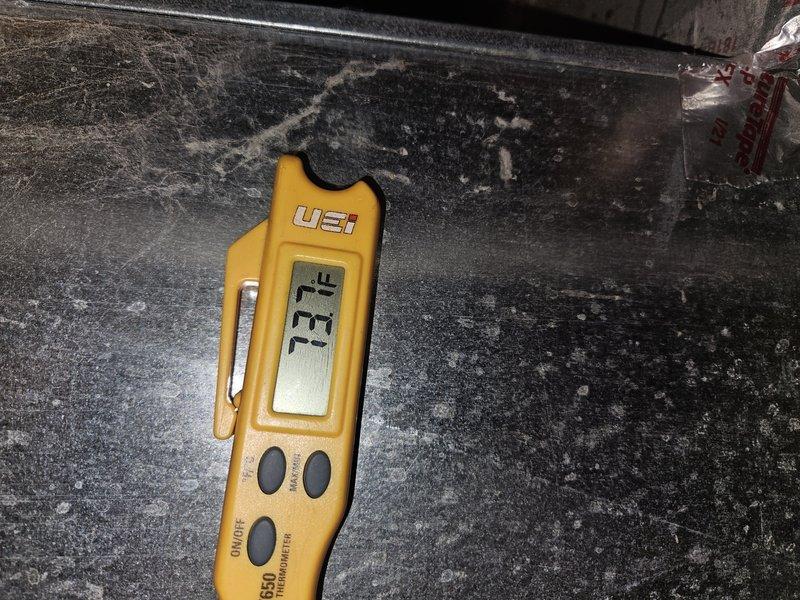 Responded to callback for AC system that stopped working shortly after thermostat replacement. Upon arrival, performed diagnostic temperature readings on supply ductwork, measuring 93.7°F and 37.3°F at different points in the system to assess airflow and cooling performance. Investigated underlying cause of system failure beyond the previously replaced thermostat to determine why unit ceased operation after initial repair.