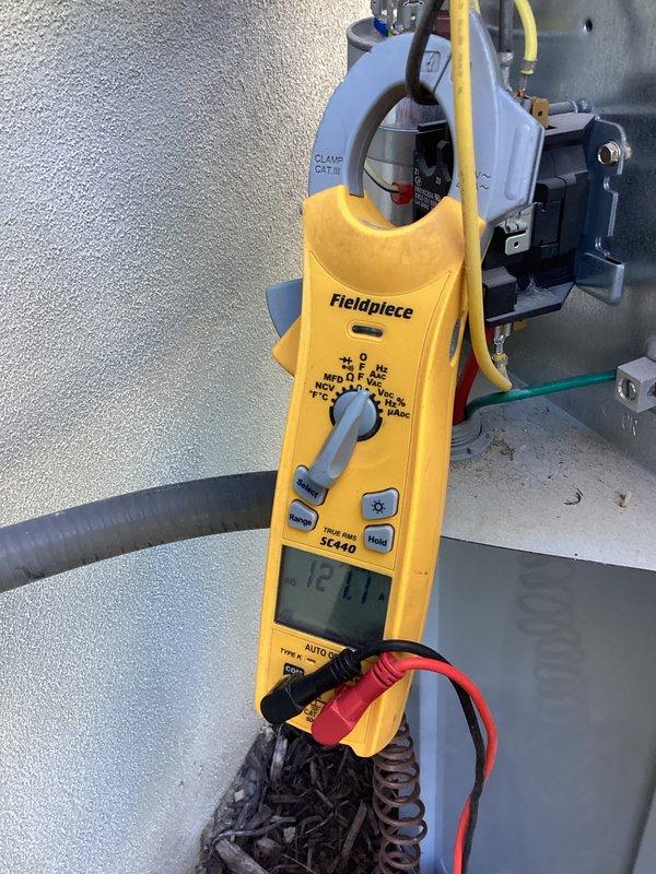 Completed annual cooling maintenance on 3-year-old residential AC system. Performed standard inspection and identified compressor overamping at startup, measuring 121 amps against nameplate rating of 110 amps. Recommended and installed hard start kit to reduce electrical demand and extend compressor lifespan. Post-installation diagnostics confirmed successful reduction of startup amperage from 121 amps to 76 amps, bringing system within normal operating parameters. Performed routine maintenance cleaning of blower motor assembly and associated components. All electrical connections inspected and secured. System tested and operating efficiently with improved performance characteristics.