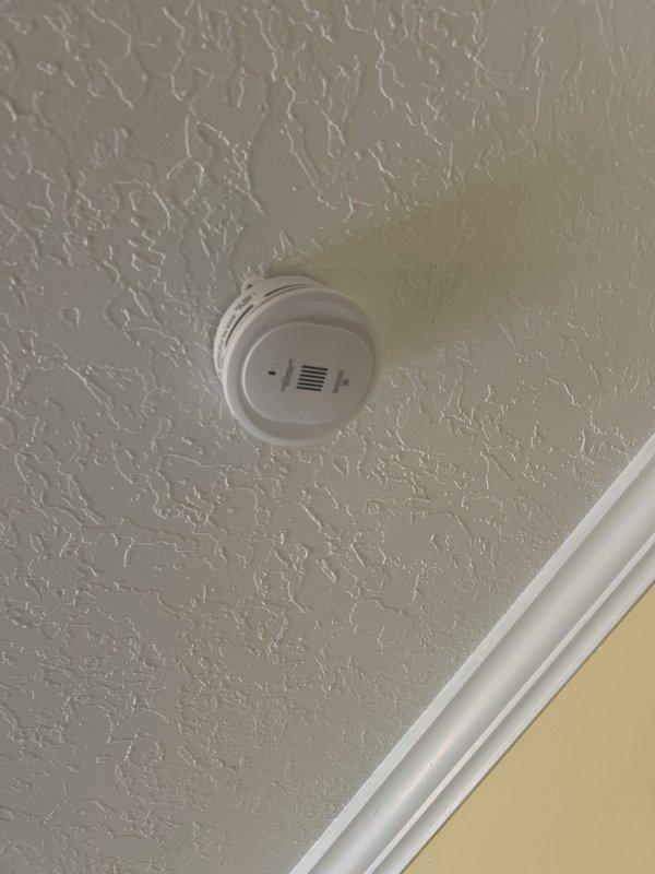 Completed routine membership electrical inspection of residential property with no reported issues. Verified proper operation and mounting of smoke detectors throughout the home, confirming all units were securely installed on textured ceiling surfaces with clear indicator lights and adequate ventilation. All electrical safety devices inspected were found to be in satisfactory working condition.