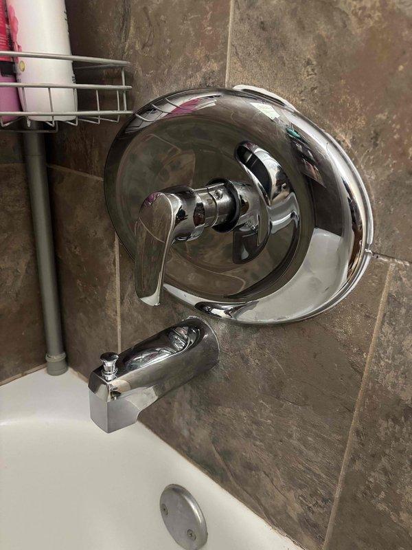 Responded to warranty callback for failed shower cartridge on previously installed Moen single-handle Positemp shower valve. Replaced defective cartridge in the chrome trim assembly, tested operation for proper temperature control and flow, and verified no leaks at connections. System restored to full functionality with smooth handle operation and appropriate hot/cold mixing.