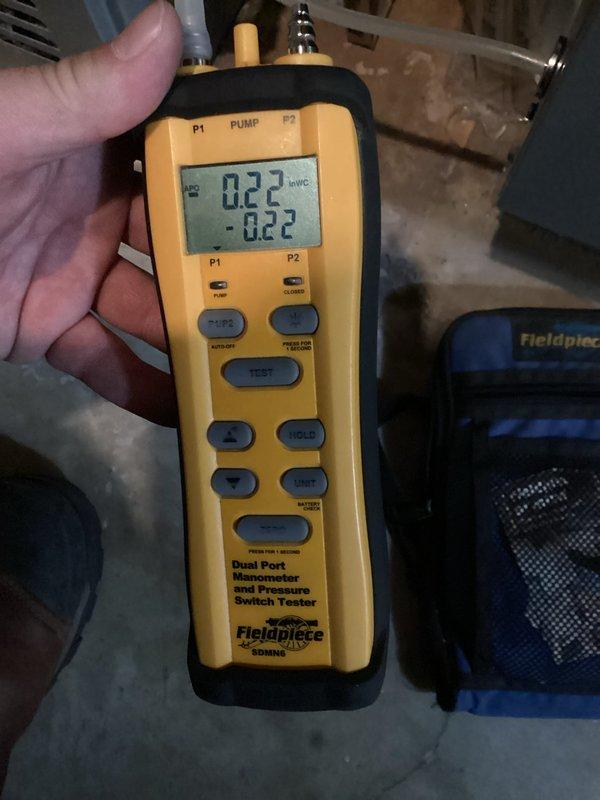 Completed membership maintenance tune-up on residential split system with air handler located in attic space and furnace in basement. Performed standard preventive maintenance procedures including inspection of air handler unit, verification of proper airflow, and pressure testing using digital manometer which confirmed static pressure readings within acceptable range at 0.22 inWC. All components operating within normal parameters upon completion of service.
