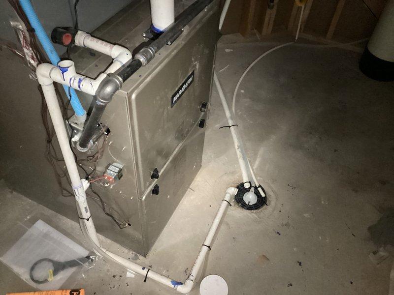 Completed annual cooling maintenance on a 4-year-old residential HVAC system with furnace located in basement and condensing unit in yard. Performed comprehensive inspection of air conditioning components, verified system temperatures using calibrated instrumentation showing 43°F readings, and inspected all accessible ductwork and refrigerant lines. System operating within normal parameters with no issues identified during maintenance visit.