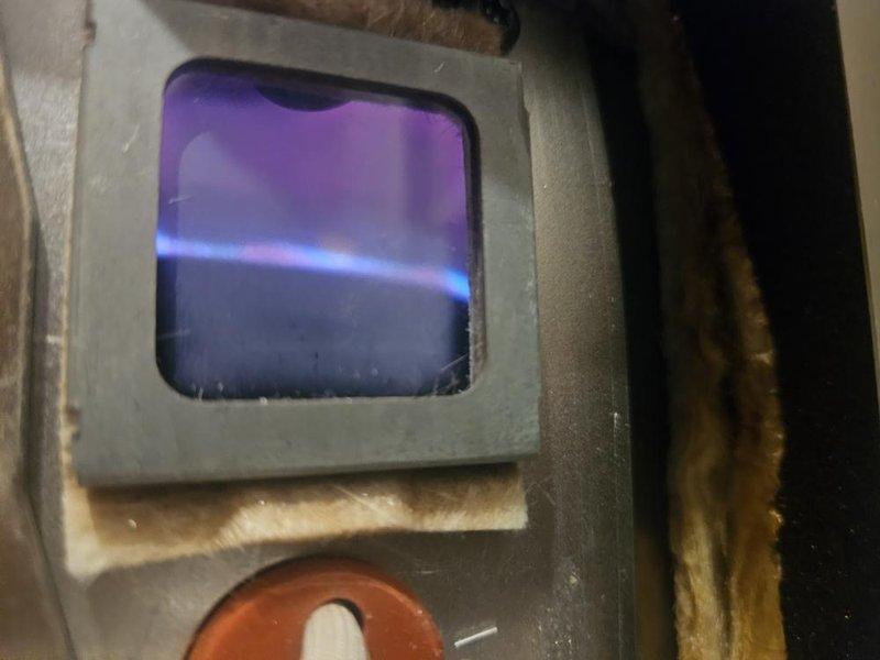 Responded to no hot water complaint on 6.5-year-old residential tank water heater. Upon arrival, confirmed unit was displaying 7 flashes on gas control valve status indicator, diagnostic code indicating gas control/valve failure. Inspected water heater and photographed control panel showing fault condition and system pressure gauge reading. Verified complete loss of hot water production and determined gas control valve requires replacement to restore functionality.