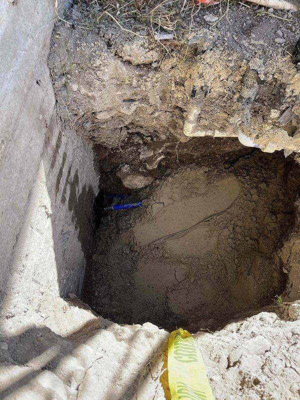 Completed full water main repair with excavation to access damaged line. Replaced main water shutoff valve and pressure reducing valve inside residence. Coordinated with municipal authorities regarding permit requirements and restored site upon completion.