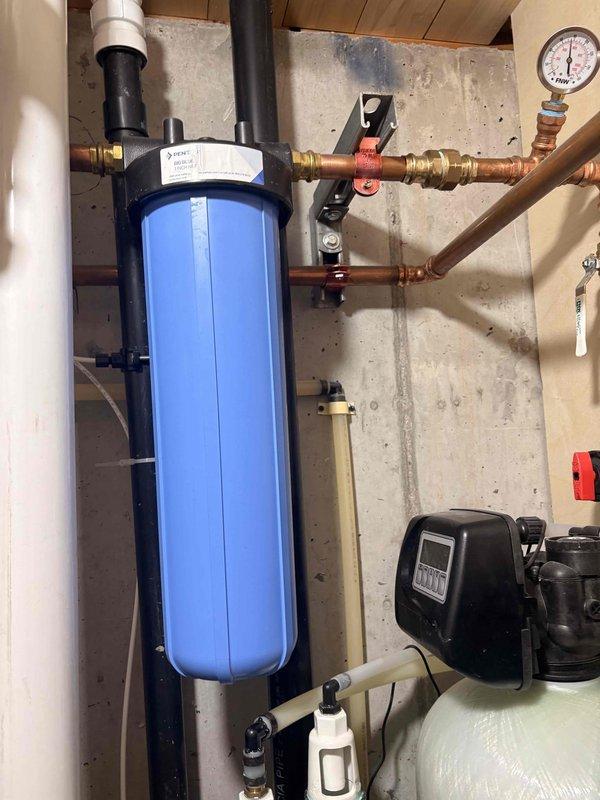 Replaced storage tank for reverse osmosis system and installed new filters including big blue sediment filter and phosphate filter. System was tested for proper operation, connections were verified leak-free, and water quality output was confirmed to meet specifications.