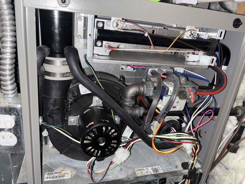 Completed fall HVAC maintenance inspection on furnace/air handler system as part of membership plan. Performed comprehensive inspection of internal components including inducer motor assembly, heat exchanger, control board, wiring connections, and electrical systems. All components found to be in operational condition with proper wire routing and secure connections throughout the cabinet.