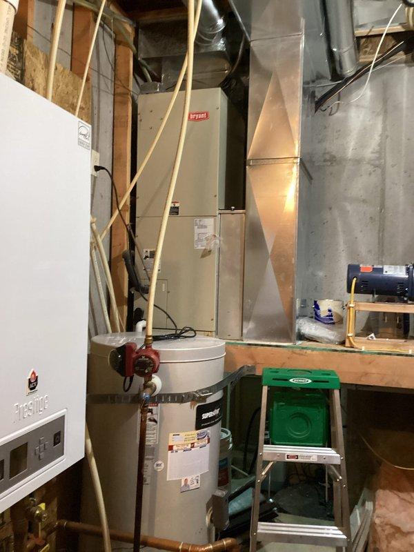 Completed preventative cooling maintenance on 20-year-old single-zone air conditioning system. Accessed outdoor condenser unit located on lower deck and inspected Bryant HVAC equipment in lower floor utility area alongside boiler system. Performed standard Cool 10+ maintenance protocol including system performance verification, confirming all components operating within normal parameters with no issues identified.