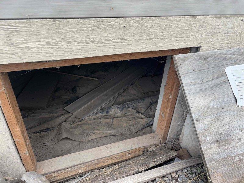Responded to service call for malfunctioning exterior hose bib that was leaking and difficult to shut off, requiring excessive force to stop water flow. Upon arrival, performed diagnostic assessment of the outdoor water tap and determined the valve stem and internal components had deteriorated due to age and weather exposure. Accessed crawl space through exterior siding opening to locate and isolate the water supply line serving the affected fixture. Shut off water supply to the exterior tap and drained remaining water from the line. Removed the failed hose bib assembly from the exterior wall penetration. Inspected the supply piping and mounting location for any additional damage or corrosion. Installed new frost-free hose bib with updated valve mechanism to ensure proper operation and ease of use. Secured fixture to exterior wall and sealed penetration to prevent water intrusion and air infiltration. Restored water supply and tested new hose bib for proper flow, complete shut-off capa
