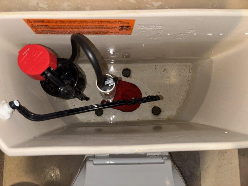 Responded to master bathroom toilet that was continuously running after flushing. Inspected tank components and identified worn flapper valve and fill valve assembly requiring replacement due to mineral buildup and deteriorated seals. Replaced defective flapper and fill valve mechanism, adjusted water level, and tested flush cycle to ensure proper operation and complete shutoff.