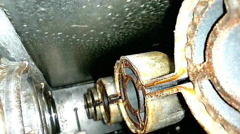 Performed furnace tune-up and diagnostics to address reported rattling and revving noises from HVAC system. Inspected 2-year-old tank water heater in basement as part of membership maintenance visit. Upon inspection, identified significant corrosion and rust buildup on water heater components, including heavily deteriorated pipe fittings, compression valves, and connection points showing advanced oxidation and mineral deposits, indicating extended exposure to moisture without proper maintenance.