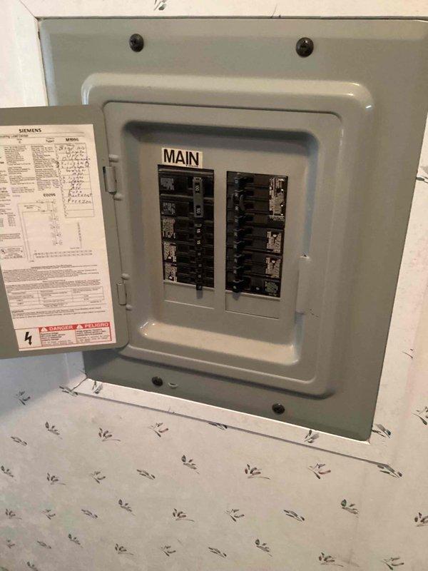 Completed routine electrical maintenance inspection on residential Siemens main electrical panel as part of membership plan. Performed visual inspection of all circuit breakers, verified proper operation of main disconnect, and examined wire terminations on neutral and ground bus bars. Inspected panel interior for signs of overheating, loose connections, or damaged components. All circuit breakers found to be functioning properly with no signs of wear or damage. Verified wire routing and organization throughout panel, confirming proper color coding with white neutral wires, black hot wires, and red hot wires appropriately terminated. No safety hazards, code violations, or maintenance issues identified during inspection. Panel found to be in good operating condition with all components secure and properly installed.
