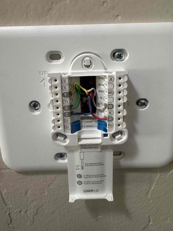 Completed comprehensive Green Shield cooling maintenance on single HVAC system located in basement. Performed full system diagnostics using combustion analyzer, recording oxygen levels at 6.04%, carbon monoxide readings, and temperature differentials (343°F and 76.9°F) to verify proper furnace operation and combustion efficiency. Inspected thermostat wiring configuration, confirming all wire connections secure at terminal blocks including green, red, yellow, blue, and white conductors. Verified refrigerant warning labels and equipment specifications present and legible per federal regulations. All equipment operating within manufacturer specifications with no reported issues or deficiencies found during inspection.