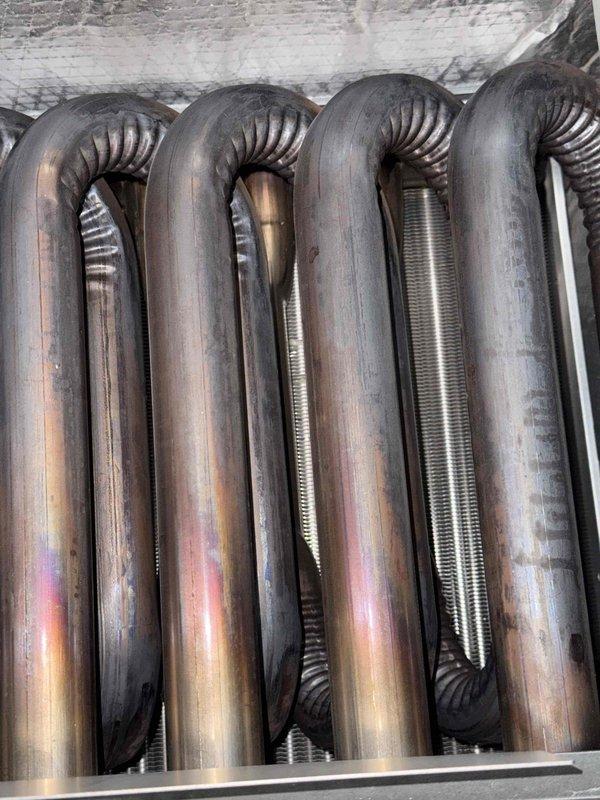Performed comprehensive combustion analysis and heat exchanger inspection on residential HVAC system to verify safe operation and component integrity. Conducted thorough examination of heat exchanger for cracks, corrosion, or structural damage that could compromise system safety. All combustion parameters tested within manufacturer specifications, and heat exchanger confirmed to be in good operational condition with no safety concerns identified.
