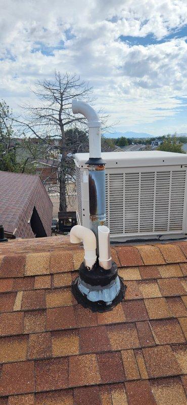 Completed full water heater replacement including removal and disposal of existing unit and water softener. Shut off water supply at meter, drained system, and replaced gate valve main shutoff with quarter turn ball valve. Installed new 40-gallon Rheem power vent water heater with PVC venting routed through existing flue penetration to roof. Installation included new isolation valves, flexible gas and water supply lines, seismic straps, drain pan piped to exterior drain, T&P relief valve drop tube, gas line sediment trap, and thermal expansion tank. All work performed to code with permit obtained and inspection completed.
