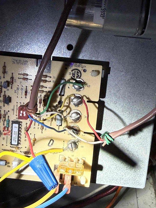 Completed in-home furnace replacement estimate at residential property. Inspected existing heating system located in unfinished basement area, including furnace control board, electrical connections, and associated ductwork. Photographed current equipment configuration showing circuit board with multi-wire connections, capacitor assembly, and terminal connections in good operating condition. Assessed installation environment including utility space layout, existing copper plumbing lines, flexible ductwork routing, and available clearances for equipment replacement. Discussed equipment options including Trane and American Standard brands, as well as comparable high-efficiency furnace models suitable for the application. Provided comprehensive replacement recommendations and system specifications for customer consideration.