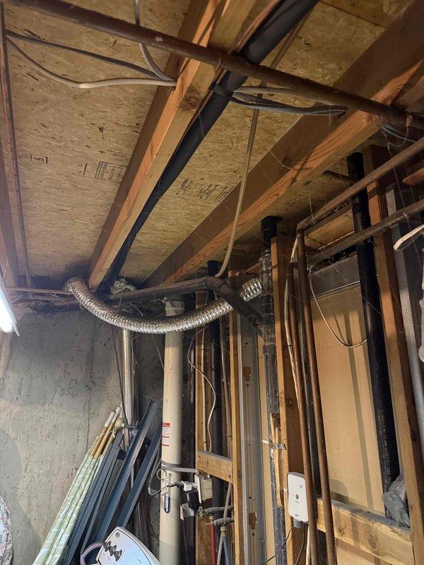 Completed in-home furnace replacement estimate at residential property. Inspected existing heating system located in unfinished basement area, including furnace control board, electrical connections, and associated ductwork. Photographed current equipment configuration showing circuit board with multi-wire connections, capacitor assembly, and terminal connections in good operating condition. Assessed installation environment including utility space layout, existing copper plumbing lines, flexible ductwork routing, and available clearances for equipment replacement. Discussed equipment options including Trane and American Standard brands, as well as comparable high-efficiency furnace models suitable for the application. Provided comprehensive replacement recommendations and system specifications for customer consideration.