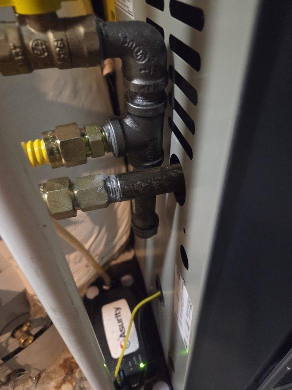 Completed full furnace replacement in basement, installing 80,000 BTU 2-stage unit model S8X2B080M4 to replace existing system that had a cracked heat exchanger. Replaced standard pressure switch with high-altitude pressure switch for proper operation. Upgraded thermostat to T6 model with 5-wire connection to accommodate 2-stage heating functionality. Connected unit to existing 6-inch main flue stack. Provided 10 additional 20x20x1 filters for ongoing maintenance. Removed old furnace from premises for proper disposal, tagged with appropriate job information for tracking purposes.