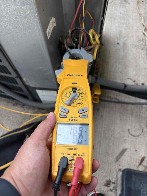 Performed follow-up maintenance on residential AC system as part of Member Maintenance 5-9 service. Conducted comprehensive electrical diagnostics including amperage draw testing showing 105A and performed under-load capacitor analysis on the run capacitor. Capacitor testing revealed a 45 MFD rated capacitor measuring 48.22 MFD actual capacitance, representing a 7.15% variance from nameplate specifications, which falls within acceptable operating parameters for the system.