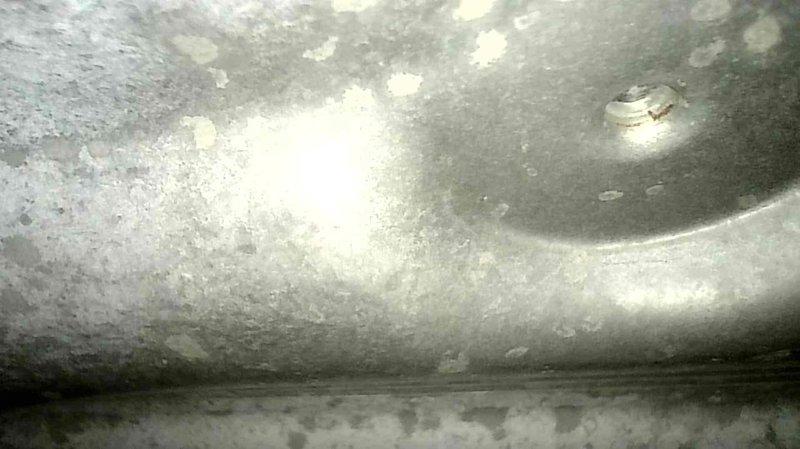 Completed annual heating maintenance on 10+ year old furnace system located in basement. Performed comprehensive inspection of heat exchanger, burner assembly, and all mechanical components per maintenance protocol. Documented visible surface oxidation and mineral deposits on ductwork and heat exchanger components, consistent with age of equipment, though no operational deficiencies were noted during inspection.