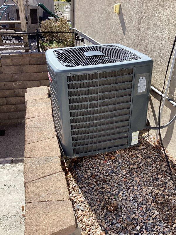 Completed comprehensive air conditioning tune-up and preventive maintenance inspection on residential outdoor condensing unit as part of membership benefits. Performed electrical diagnostics using Fluke 323 True RMS clamp meter, recording 5.8 AAC amperage reading to verify proper compressor and fan motor operation within manufacturer specifications. Inspected condenser coil fins, verified refrigerant line connections, checked electrical connections and contactors, and confirmed unit operational status with all components functioning properly.