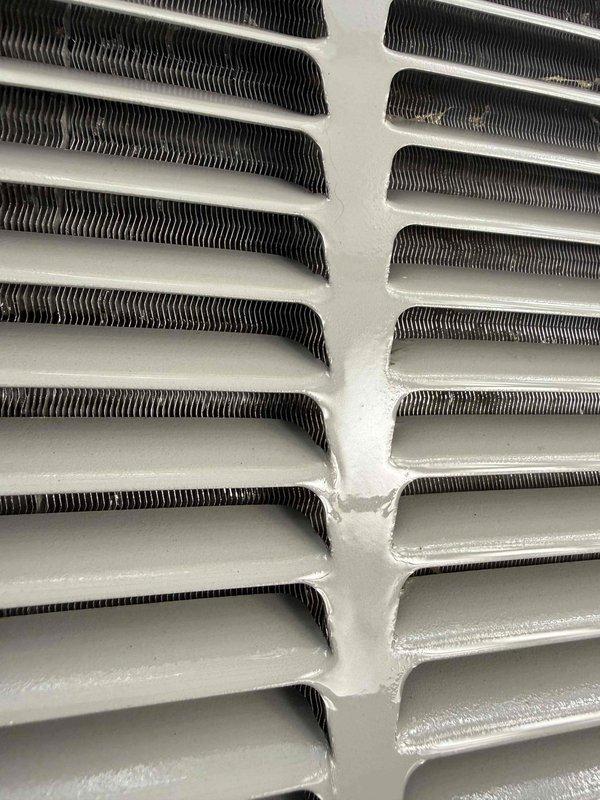 Completed comprehensive maintenance service on two HVAC systems consisting of a 3-year-old air conditioning unit and furnace. Performed full cooling system tune-up on exterior AC unit, including inspection of condenser coils, refrigerant levels, and operational testing. Temperature measurements taken at multiple points confirmed system performance, with supply air temperature reading 57.4°F. Conducted heating system maintenance on basement-located furnace, completing standard preventive maintenance protocols. During AC inspection, identified frost accumulation on evaporator coil fins indicating potential airflow restriction or refrigerant issue requiring monitoring. Both systems operational at time of departure with routine maintenance tasks completed per membership service agreement.