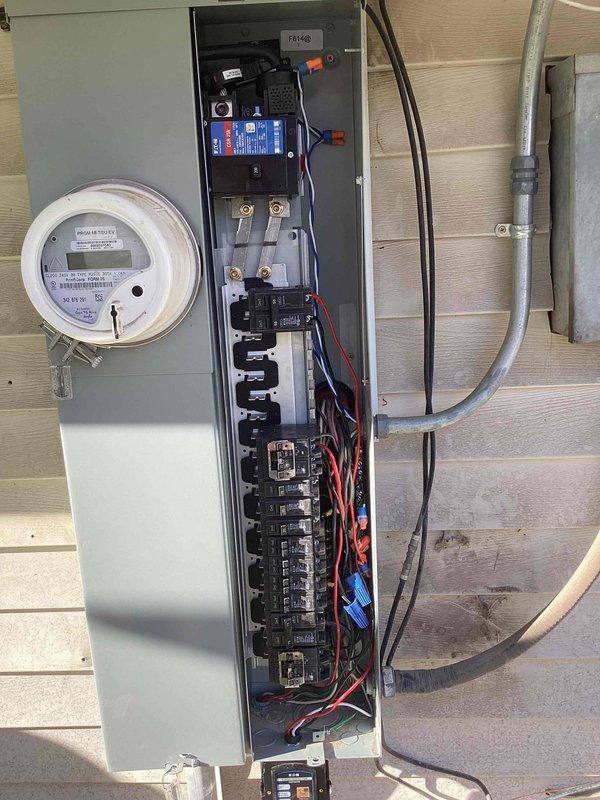 Responded to emergency service call for sparking at main breaker panel and flickering lights following recent HVAC installation. Inspected 37-year-old electrical panel and identified safety hazards requiring immediate attention. Coordinated utility shutdown with power company and obtained necessary permit for complete panel upgrade. Replaced outdated main service panel with new code-compliant electrical panel, installed modern circuit breakers, and rewired all branch circuits with proper connections. Integrated existing solar PV system with rapid shutdown components into new panel configuration, ensuring all dual power supply warning labels and safety signage met current NEC requirements. Verified all connections, tested circuit functionality, and confirmed proper grounding throughout the system.