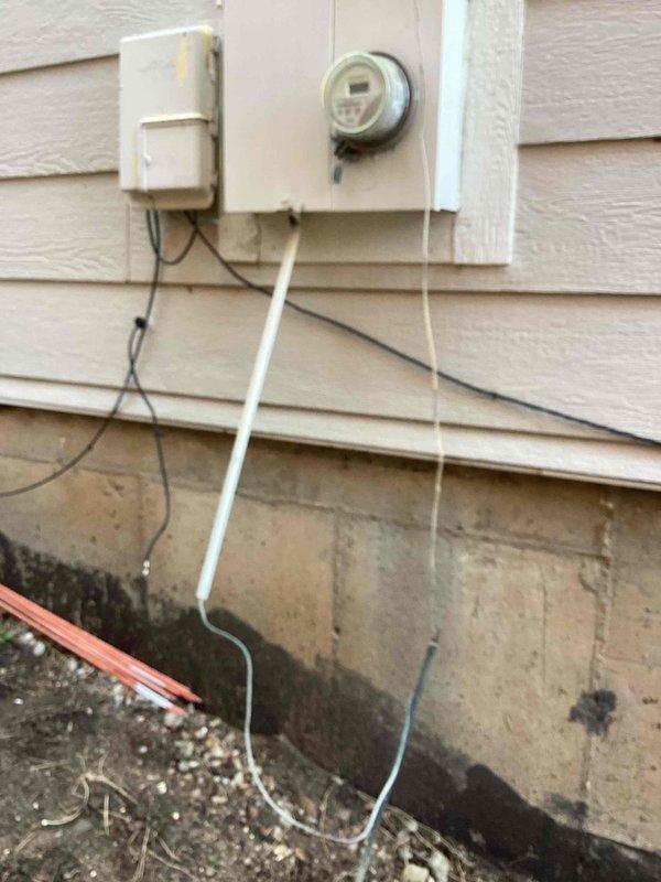 Completed annual electrical maintenance visit including comprehensive inspection of main electrical panel, circuit breakers, and exterior meter installation. Verified proper operation of all breaker switches, confirmed secure mounting of panel and meter assembly on exterior wall, and inspected electrical conduit connections and wiring runs. All components found to be functioning within normal parameters with no immediate safety concerns identified.