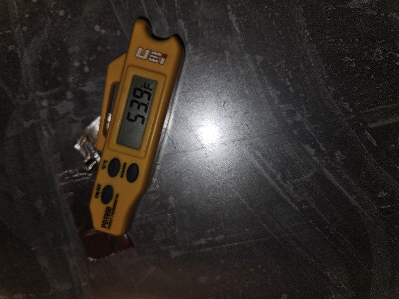 Responded to no-cooling call on 4-5 year old basement system with intermittent cycling and red indicator light on furnace. Diagnosed tripped SAFE-T-SWITCH SS2-95P condensate overflow safety device causing system lockout. Verified supply air temperature at 53.3°F after clearing condensate blockage and resetting safety switch, restoring normal system operation.